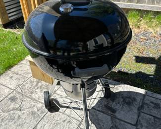 Weber charcoal grill: charcoal and accessories included; $90