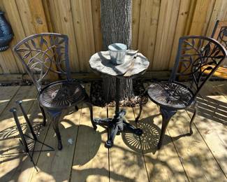 Metal chairs and wrought iron table (needs new top); $100