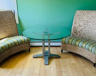 Pair of banquette benches (48" t x 42" L x 31" d) $450 ea.; glass-topped metal base table (48" round) $200