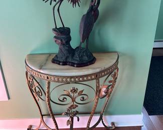 Marble topped metal half table; 30" t x 27" w; $500