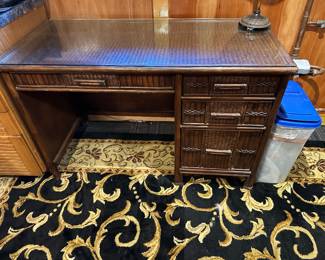 Rattan desk with glass top; 23" d x 48" L x 31" t $85