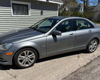 2012 Mercedes C250; grey; 4-door; 43,603 miles; rear camera navigation; heated seats; Harmon Karden stereo; memory seats: $11,000