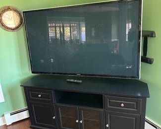 2013 Panasonic 64" TV $100; black TV stand 59" w x 27" t x 23" d; $60