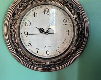 Quartz round wall clock 12.5"; $18