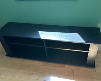 Black wooden bench; 58" L x 15" d x 18" t; some damage to back corner; $45