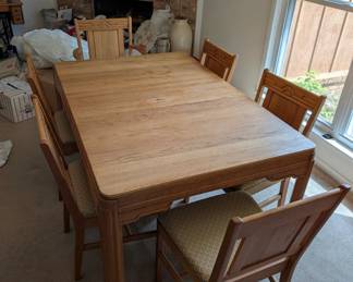 Oak dining table and chairs to be sold as unit 1930s? 