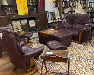Ekornes furniture including 2 chairs and ottomans, love seat and side table with a matching coffee table with storage.