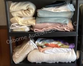 Blankets, linens, shelving