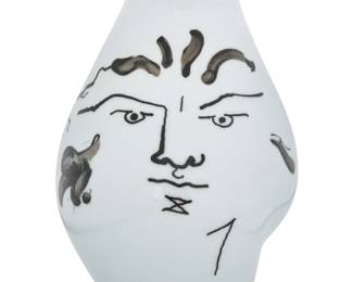 76 Jean Cocteau (1889-1963) A "Têtes" porcelain vase for Rosenthal, 1950s Designed 1952 Signed and dated to side: Jean Cocteau / [star]; with printed factory marks to underside and applied label: Decor: / JEAN COCTEAU / Echtes früherer Zeiten. CLASSIC 9.75" H x 6.25" W x 6.5" D Estimate: $200 - $300