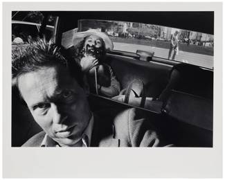 278 Ryan Weideman (b. 1941) "Self-Portrait with Wild Woman & Cat," from "In My Taxi: New York After Hours" series, 1987 Gelatin silver print on paper Edition: 7/10 Signed, titled, dated, numbered, and with other numeric notations in pencil, verso: Ryan Weiderman 1987 © / "V 3 1/2 / 5.6 / 20 / D162 / B06291.1C" Image: 12.375" H x 18.25" W; Sheet: 16" H x 20" W Estimate: $1,000 - $1,500