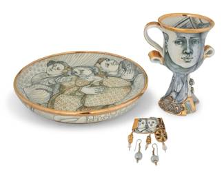 315 Mary Lou Higgins (1926-2012) A collection of art pottery items and a greeting card, circa 1980s The bowl and broach each signed and dated '86 or '87': Mary Lou Higgins; the bowl incised: M Each with gilt-painted highlights, comprising a low bowl, a handled goblet, a brooch, a pair of earrings, and a hand-illustrated and inscribed paper greeting card 6 pieces Bowl: 10.5" Dia.; Goblet: 6.625" H; Card: 11.125" H x 7" W; Brooch: 2.75" H; Earrings: 1.625" H Estimate: $800 - $1,200