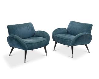 172 In the manner of Gio Ponti (1891-1979) A pair of Modern lounge chairs, mid-20th century Each unmarked Each with velvet fabric upholstery and flared armrests, raised on tapered wood legs with metal sabots 2 pieces Each: 27.5" H x 32.5" W x 27.25" D Estimate: $700 - $900