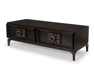 367 A Monteverdi-Young hardwood low cabinet Mid-20th century Unmarked Each cabinet door mounted with foliate pulls carved in high relief, opening to reveal an open compartment 21.125" H x 66" W x 29.25" D Estimate: $300 - $500