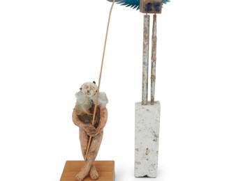 128 Grady Kimsey (1928-2025) A group of figural sculptures, late 20th century Each unmarked Ceramic, wood, metal, and feathers, comprising a figure with mask depicted hoisting a bird and mounted to a wood stand, an angel totem, a ceramic head, and a spear 4 pieces Totem: 18.5" H x 7.5" W x 4" D; Figure: 8.5" H x 3.5" W x 3.5" D Estimate: $400 - $600