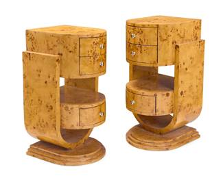 16 A pair of Austrian Art Deco style side tables Late 20th century Amboyna wood, with three drawers 2 pieces Each: 35" H x 18.5" W x 20" D Estimate: $1,000 - $1,500