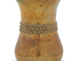 324 Sigvard Bernadotte (1907-2002) A brass vase, mid/late 20th century Impressed to underside: BERNADOTTE DESIGN With textured band at center 5.125" H x 4.125" Dia. Estimate: $200 - $300