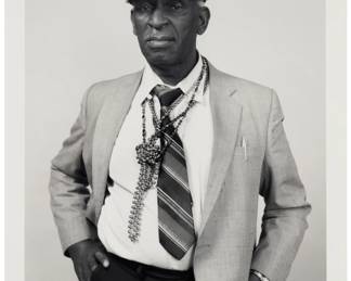 280 Ryan Weideman (b. 1941) "Earl (Dog Man) Thornton, Yellow Cab, New Orleans, LA," 1997 Gelatin silver print on paper Edition: 1/15 Signed, titled, dated, numbered, and with other numeric notations in pencil, verso: Ryan Weiderman 1997 © / "K3 / 16/ 30 / P-56 / BSG 320.16" Image: 18.125" H x 14.125" W; Sheet: 20" H x 16.125" W Estimate: $200 - $300