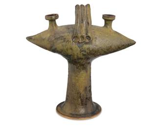 102 Takao Tomono (b. 1935) A glazed stoneware two light candelabra, mid/late 20th century Unmarked 13.625" H x 13.25" W x 5.625" D Estimate: $200 - $300