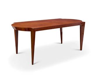 296 Dakota Jackson (b. 1949) A lacewood 'Heraldic' dining table, late 20th century Signed: Dakota Jackson / 5/01 With book matched veneer top and shaped ends, raised on tapered legs 30" H x 72.25" W x 36" D Estimate: $500 - $700