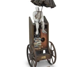 127 Grady Kimsey (1928-2025) A figural sculpture tableau, late 20th century Each unmarked Ceramic, fabric, metal, and wood, depicting a man on a cart with umbrella and a pet dog 2 pieces Cart with umbrella: 20.5" H x 6.25" W x 9.75" D; Dog: 3.125" H x 1.875" W x 3.75" D Estimate: $400 - $600