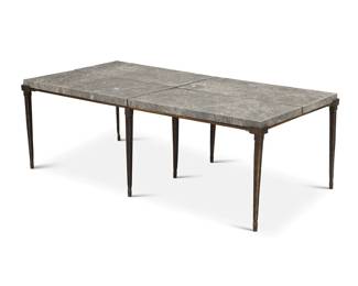 81 A Contemporary patinated bronze and marble coffee table Late 20th century With four inset marble panels, raised on tapered legs 17" H x 50.625" W x 26.5" D Estimate: $600 - $800