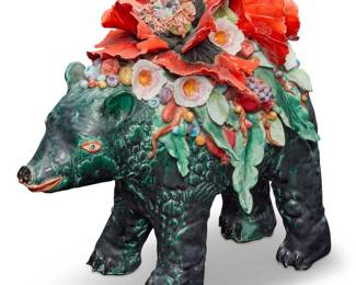 41 George Alexander (b. 1940) Bear with flowers Glazed ceramic Unmarked 16.75" H x 18.5" W x 9.5" D Estimate: $300 - $500