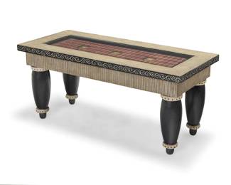293 Fabian Garcia (b. 20th century) A Postmodern coffee table, 1990s Unmarked With inset glass top revealing painted depictions of rock, paper, scissors 16" H x 36" W x 16" D Estimate: $400 - $600