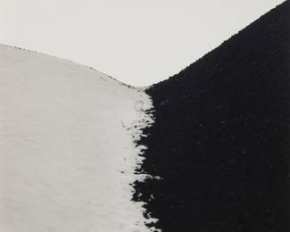 178 Joseph D. Jachna (1935-2016) "Coal and Snow," 1964 Gelatin silver print on paper From the edition of unknown size Signed, dated, and numbered, verso, according to a photocopy affixed to the frame's backing board: Joseph D. Jachna / 22264 / 4 / BH Sight: 8.5" H x 8"5" W Estimate: $300 - $500