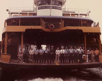 181 Neal Slavin (b. 1941) "Group Portrait, Staten Island Ferry, Narrows Bay," 1974 Chromogenic print in colors on paper mounted to board, as issued From the edition of unknown size Signed, titled, dated and inscribed in pencil on the mount, verso: Neal Slavin / 1974 / NYC Image/Sheet: 19.875" H x 16" W; Mount: 24" H x 19.875" W Estimate: $700 - $1,000