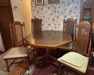 Octagon table with 6 chairs and 2 leaves
