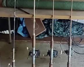 Vintage fishing poles and Penn reels