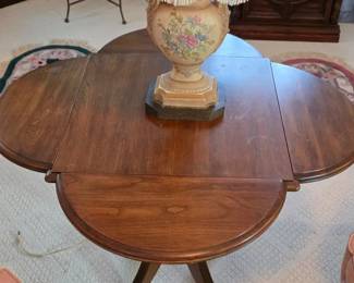 Circa 1960s clover leaf accent table with four drop leaf sides