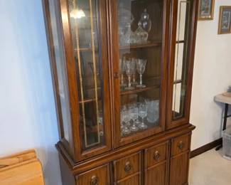 Faux bamboo china cabinet with bamboo detail in glass