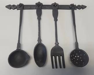 Vintage cast iron kitchen utensil wall hanging set