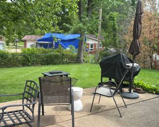 PATIO CHAIRS, FIRE PIT, UMBRELLA AND COVERED GRILL