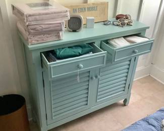 Small turquoise cabinet, Bottom has two shelves.