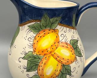Ceramic pitcher with lemon design