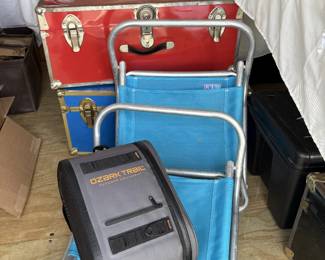 Storage trucks, beach chairs, backpack