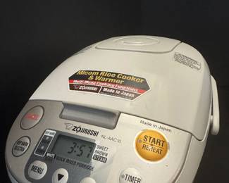 Zojirushi rice cooker (Japanese model).  Comes with steamer basket.