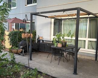 Gazebo measures 99" by 94" and 89" high.  Custom wooden beam installed.  Includes the lighting.