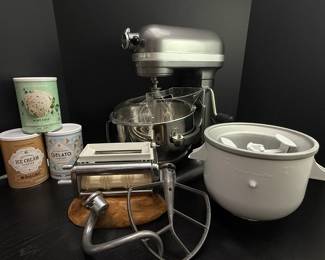 KitchenAid Mixer.  Shown here are: Icecream attachments, Standard Bowl, Dough Hook, Flat Beater, Pasta & Ravioli Maker attachment.  Not Shown: Icecream Containers