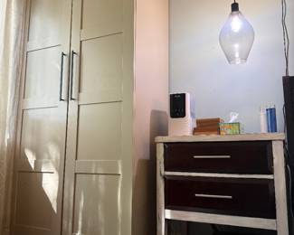 A second sidetable and overhead light, a second Ruggable Starwars Rug, and a free-standing Wardrobe