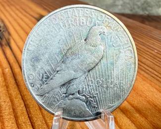 This lot features a 1935-S Peace Dollar.