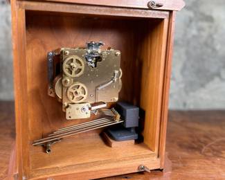 This lot features an Emperor Mantel Clock in good working condition with a key. This clock measures, 15” H x 11” W x 6” D. Franz Hermle two (2) jewel movement.