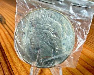 This lot features a 1927 Peace Dollar.