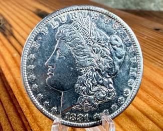 This lot features a 1881-S Morgan Dollar.