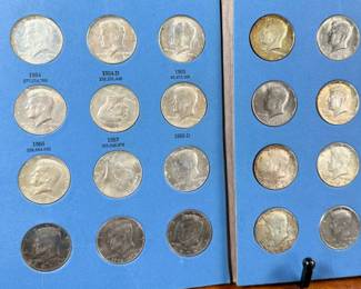 This lot features a beautiful collection of Kennedy half dollars, displayed in a Whitman folder. There are a total of thirty-six (36) Kennedys. 