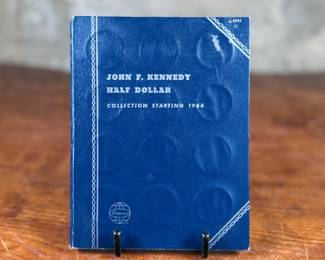 This lot features a beautiful collection of Kennedy half dollars, displayed in a Whitman folder. There are a total of thirty-six (36) Kennedys. 