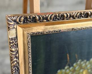 A beautiful antique oil painting signed by unknown artist. Housed in a stunning wooden frame and measures in frame, 20.5” H x 28.5” W.