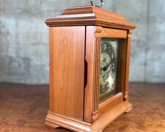 This lot features an Emperor Mantel Clock in good working condition with a key. This clock measures, 15” H x 11” W x 6” D. Franz Hermle two (2) jewel movement.